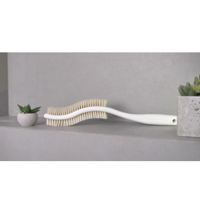 Brosse à dos ergonomique pour la douche