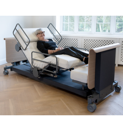Lit médicalisé électrique 1 personne rotatif et releveur Rotobed Free avec barrières métalliques